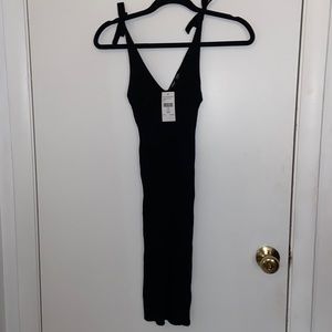 Ribbed black knit dress. Never been worn
